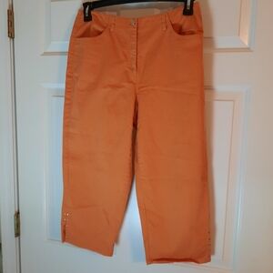 Emma james mango colored stretch capris with gems on bottom side slit sz. 10